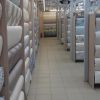 Обои, ламинат, светильники на территории развития Волгино